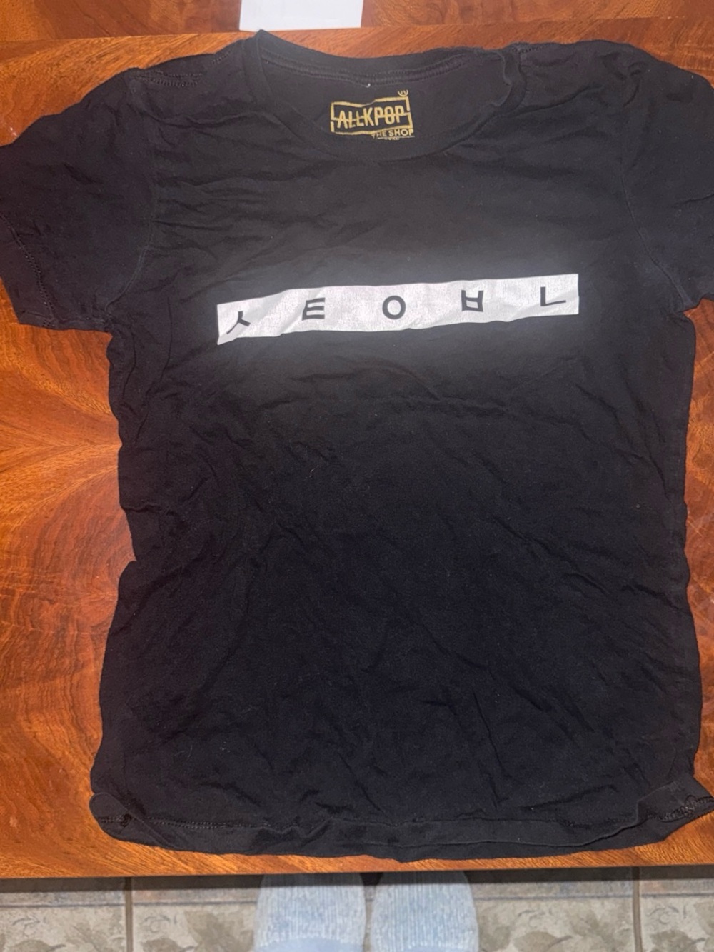 Black Graphic Tee with White Strip Text